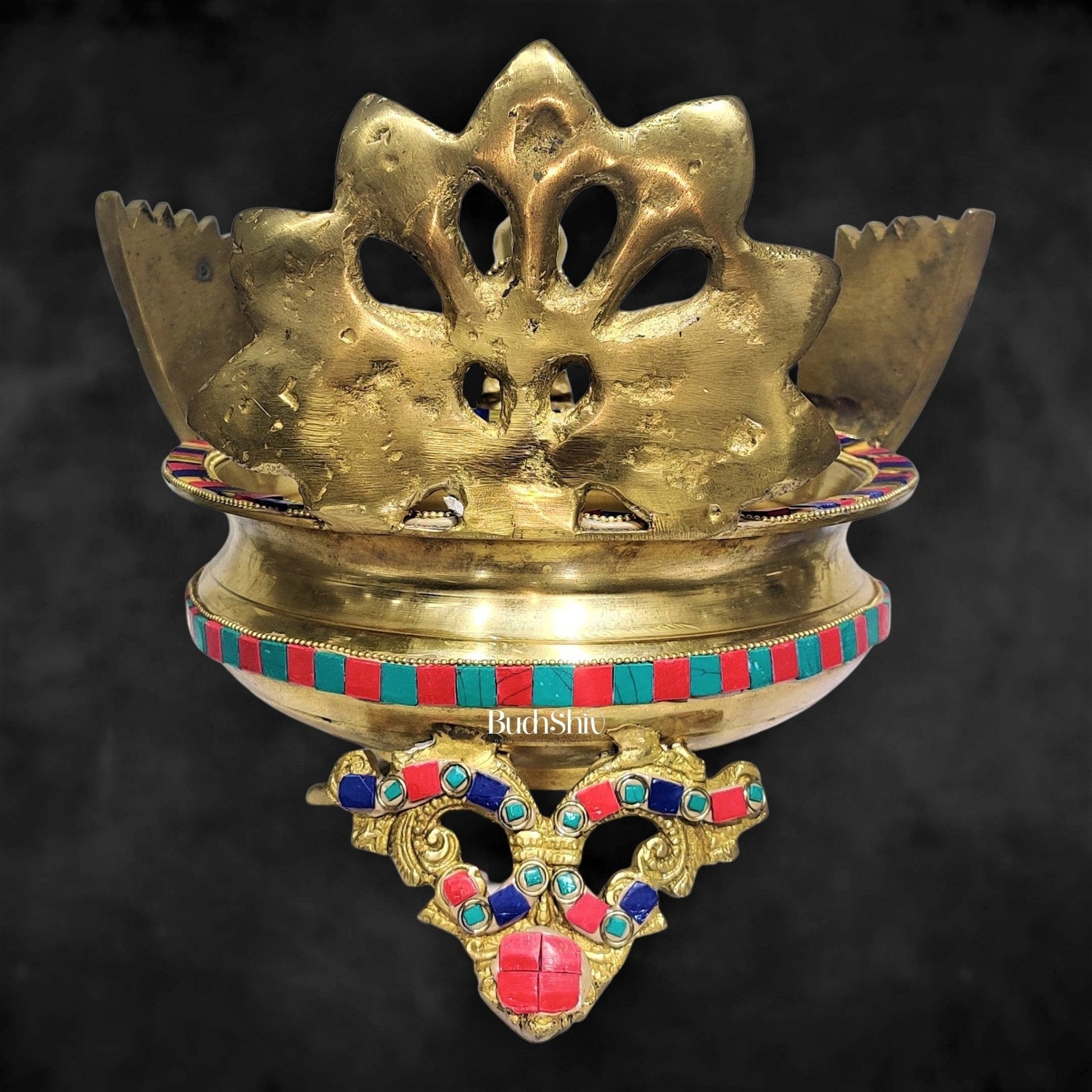 Brass peacock shaped urli with stonework