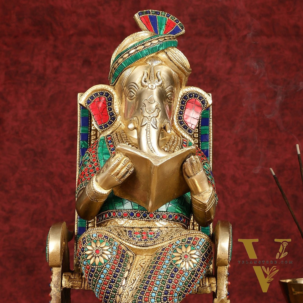 Brass  reading ganapati sitting on Chair statue 17"