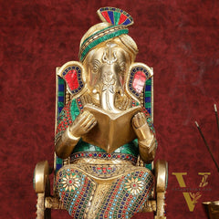 Brass  reading ganapati sitting on Chair statue 17"