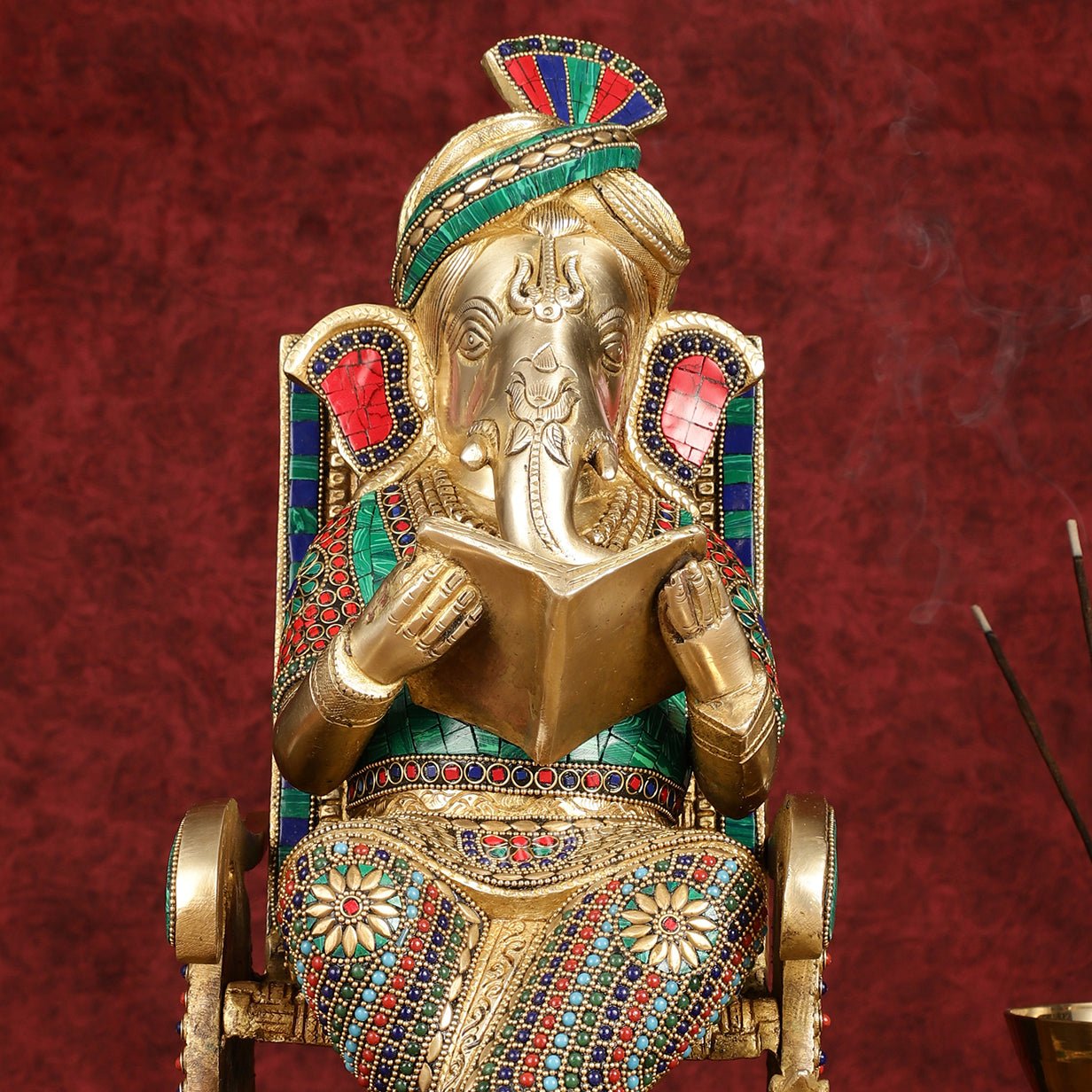 Brass  reading ganapati sitting on Chair statue 17"