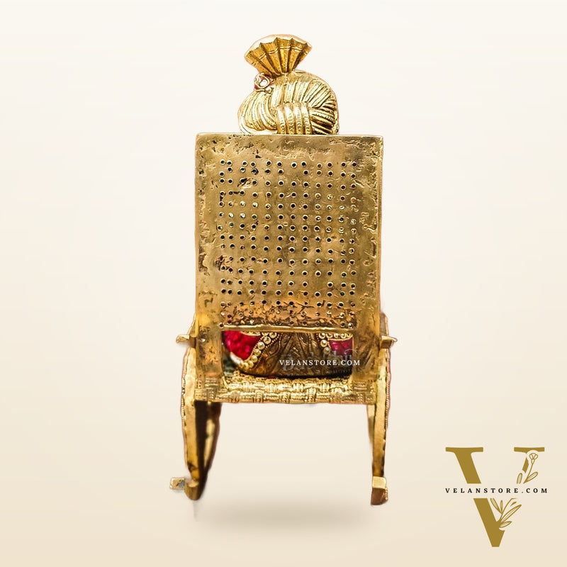 Brass reading Ganesha on Rock on Chair 17"