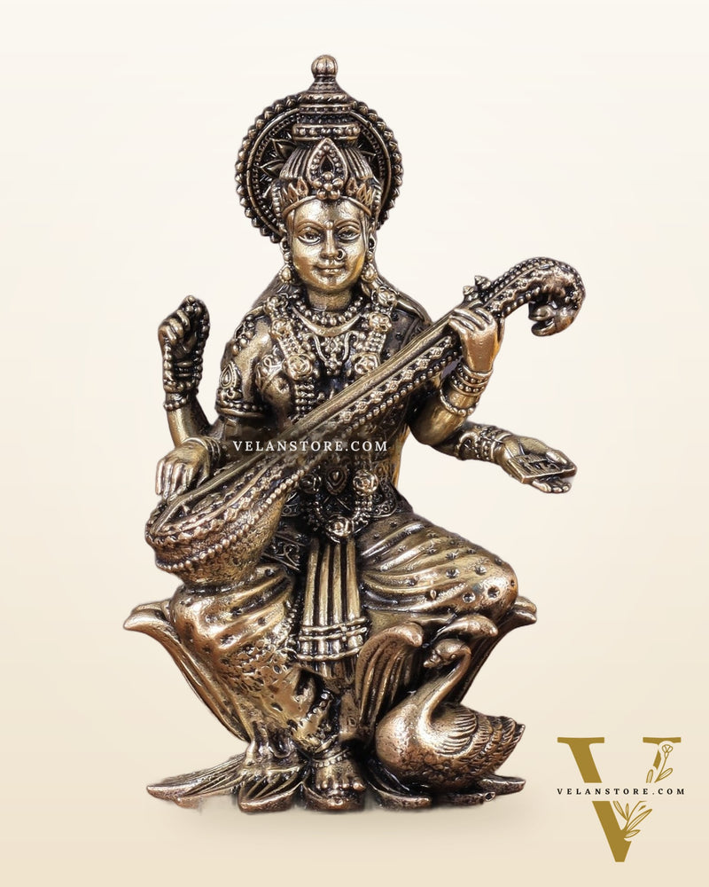 Brass Saraswati Idol Seated on Lotus 4 inch
