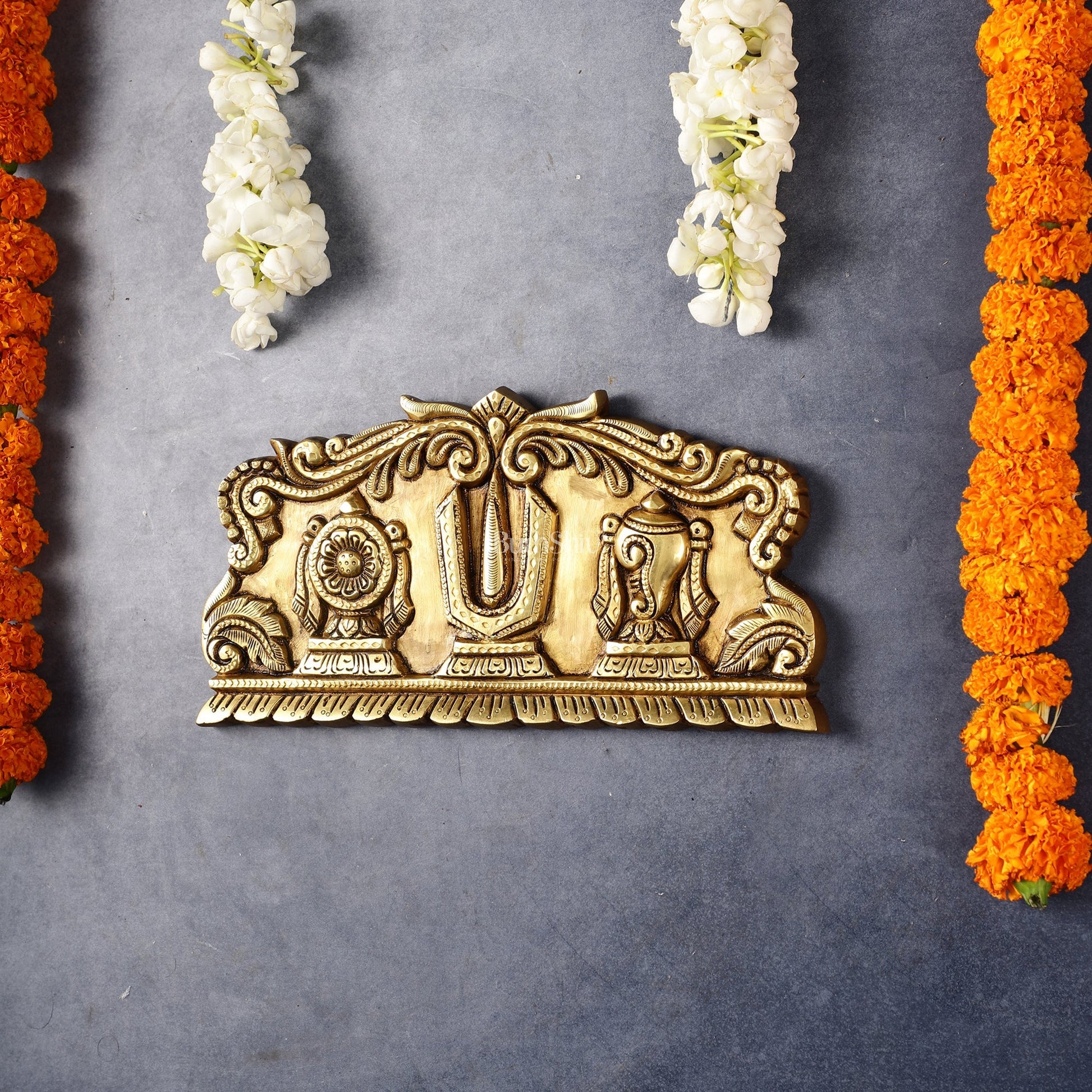 Brass Shankh Chakra Namah wall hanging