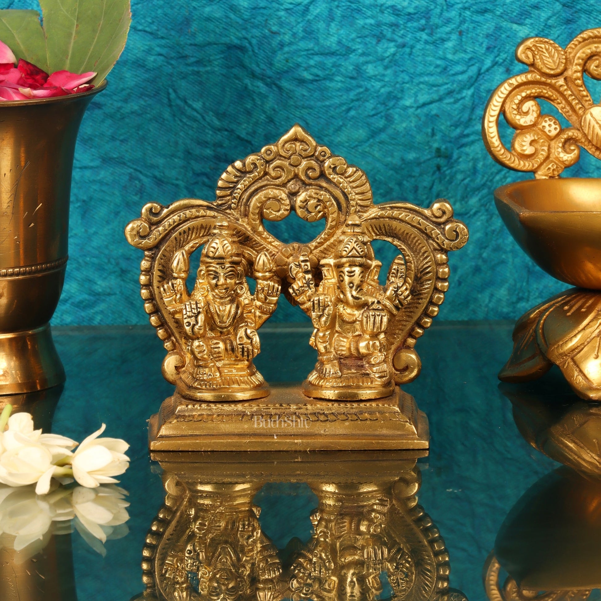 Brass small Ganesh Lakshmi idol with prabhavali frame 3.5"