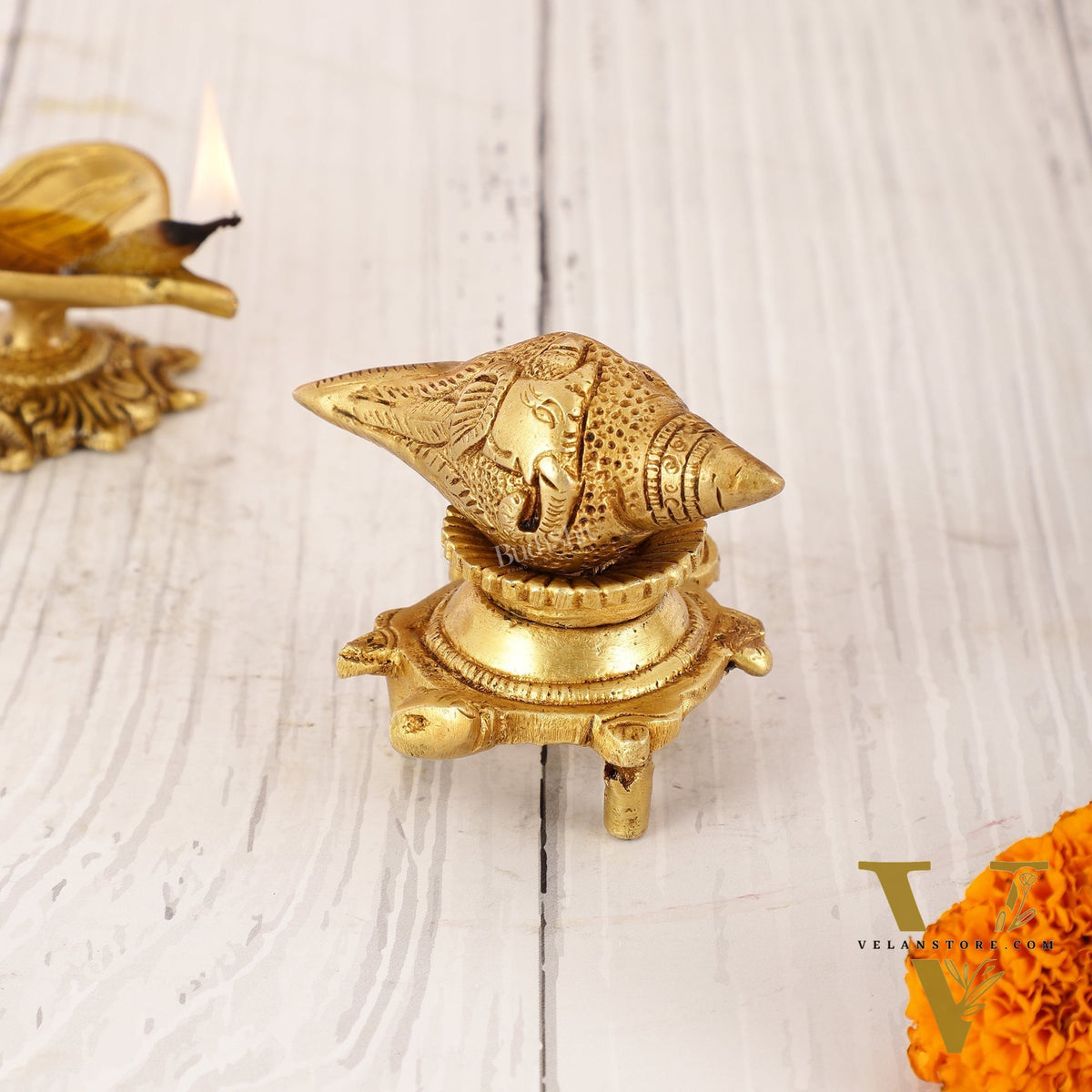 Brass small ganesha shankh on tortoise stand