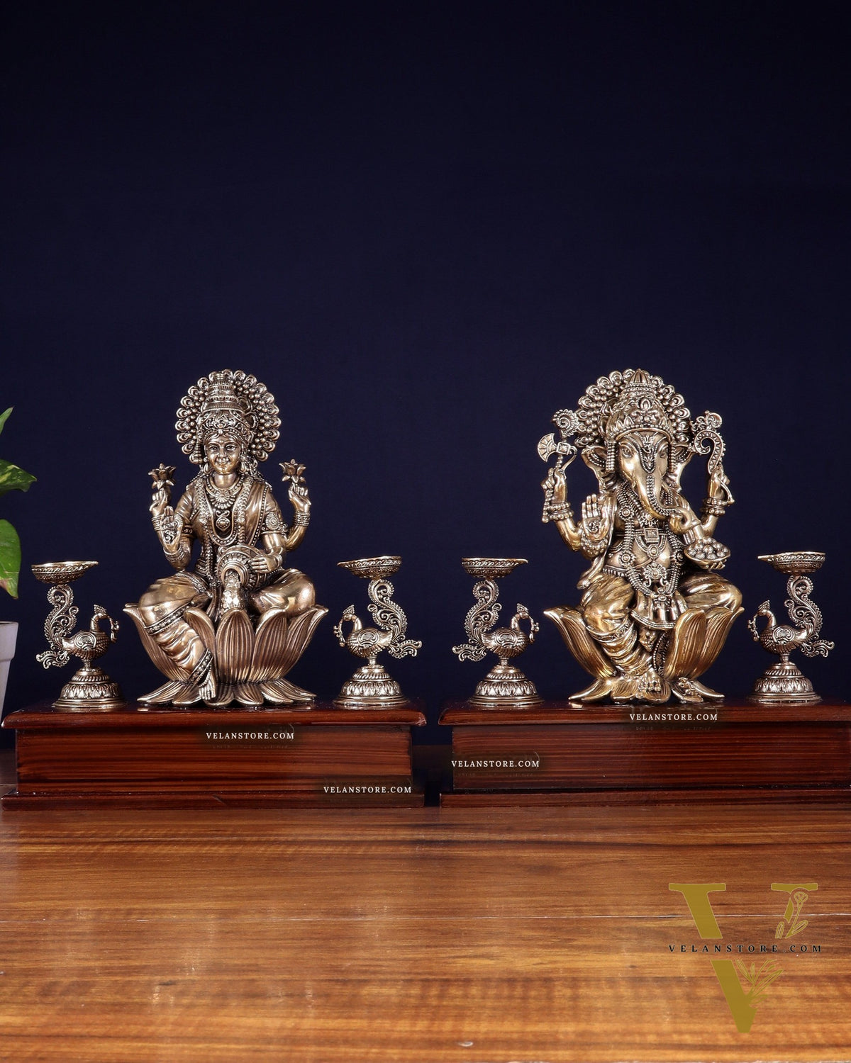 Brass Superfine Ganesh–Lakshmi Pair with Twin Peacock Lamps on Wooden Base – 9.5 Inch