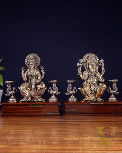Brass Superfine Ganesh–Lakshmi Pair with Twin Peacock Lamps on Wooden Base – 9.5 Inch