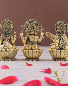 Brass Superfine Ganesh Lakshmi Saraswati Idols - 4 Inch lotus base golden tone