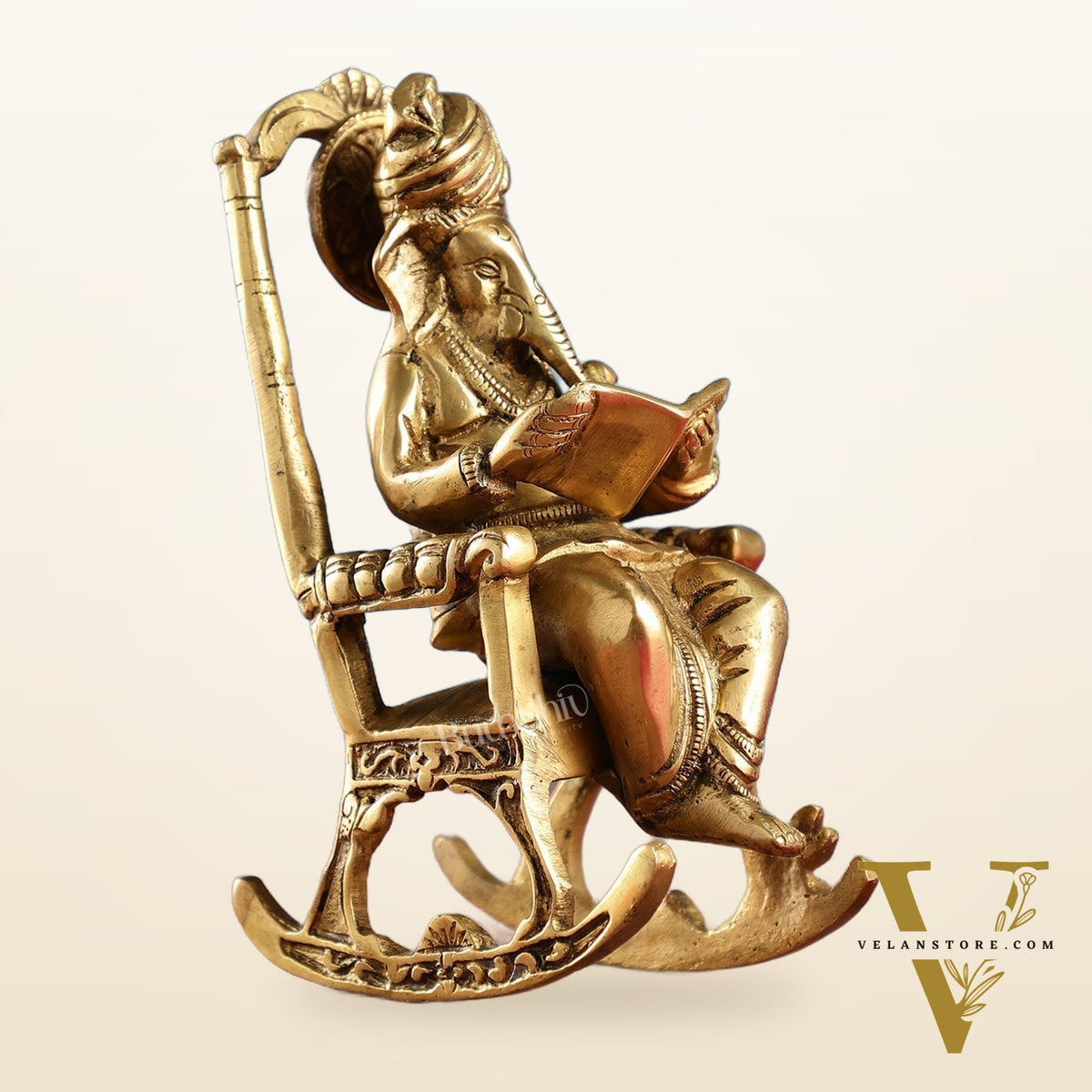 Brass superfine Ganesha on rocking chair 7"