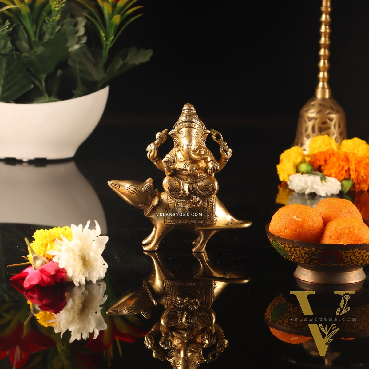 Brass superfine Ganesha seated on a mouse 5"