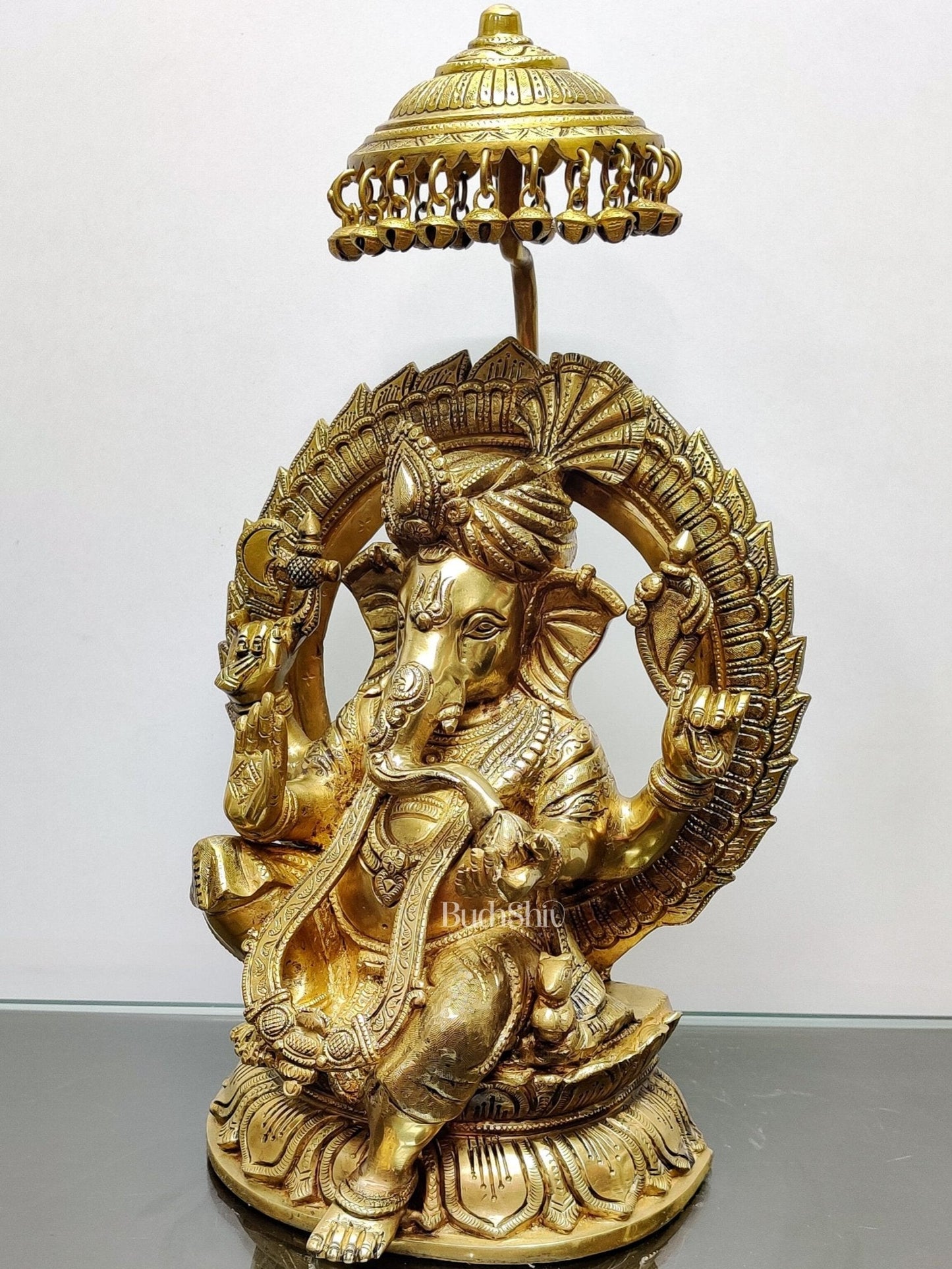 Brass Superfine Ganesha seated on a throne with umbrella 18 inch