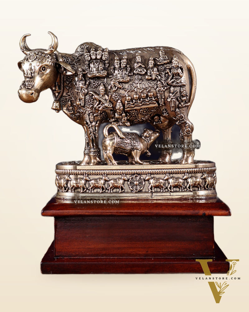 Brass Superfine Kamdhenu Cow with Calf – All Gods Engraved on Wooden Base (8.5 Inch)