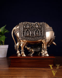 Brass Superfine Kamdhenu Cow with Calf with ashtalakshmi carvings on Wooden Base – 9.5 Inch