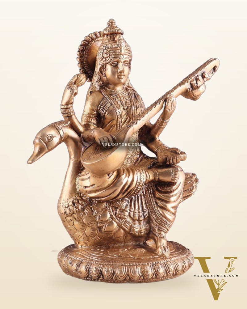 Brass Superfine Saraswati Idol - 8.5 Inch golden hues