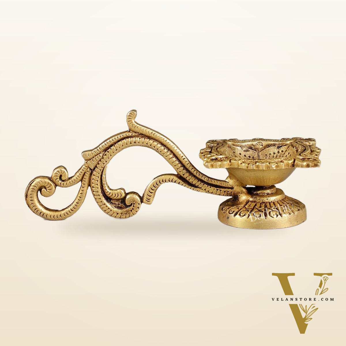 Brass unique diya with handle