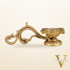Brass unique diya with handle