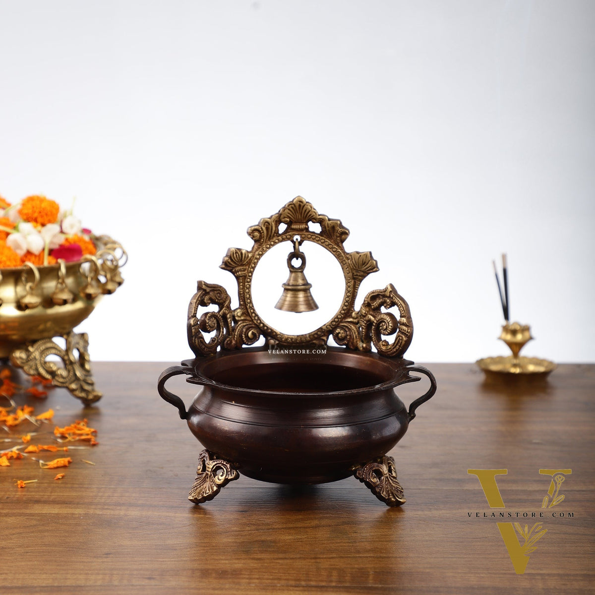 Brass urli with engraved design and bell