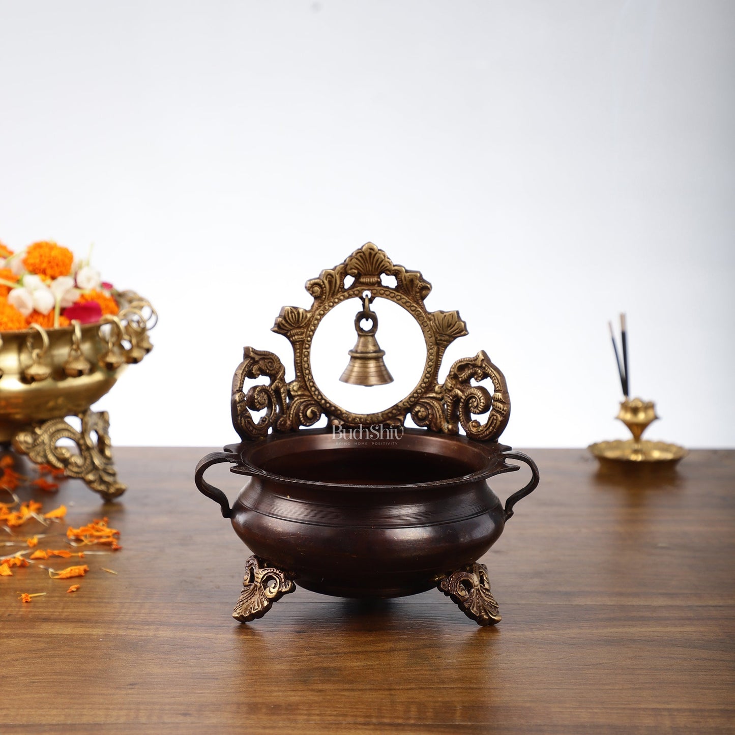 Brass urli with engraved design and bell