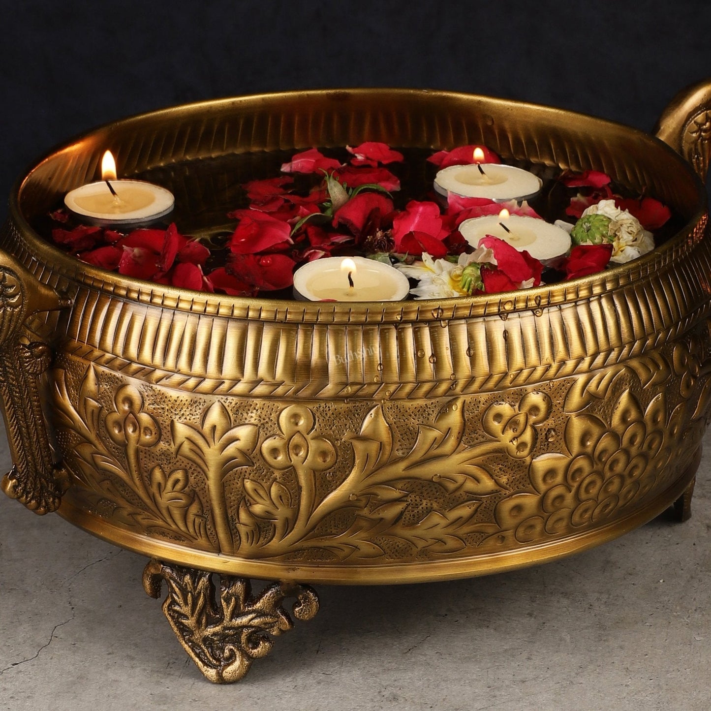 Brass Urli with peacock handles 9"