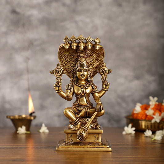 Divine 9 Inch Brass Lord Vishnu Seated with Sheshanaag Idol