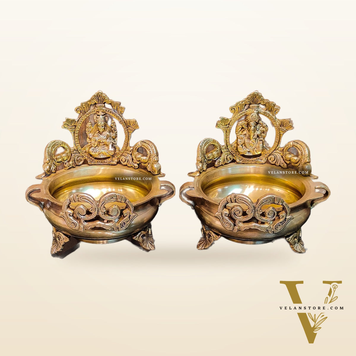 Divine Pair: Lord Ganesha and Goddess Lakshmi Brass Statues on Decorative Urli