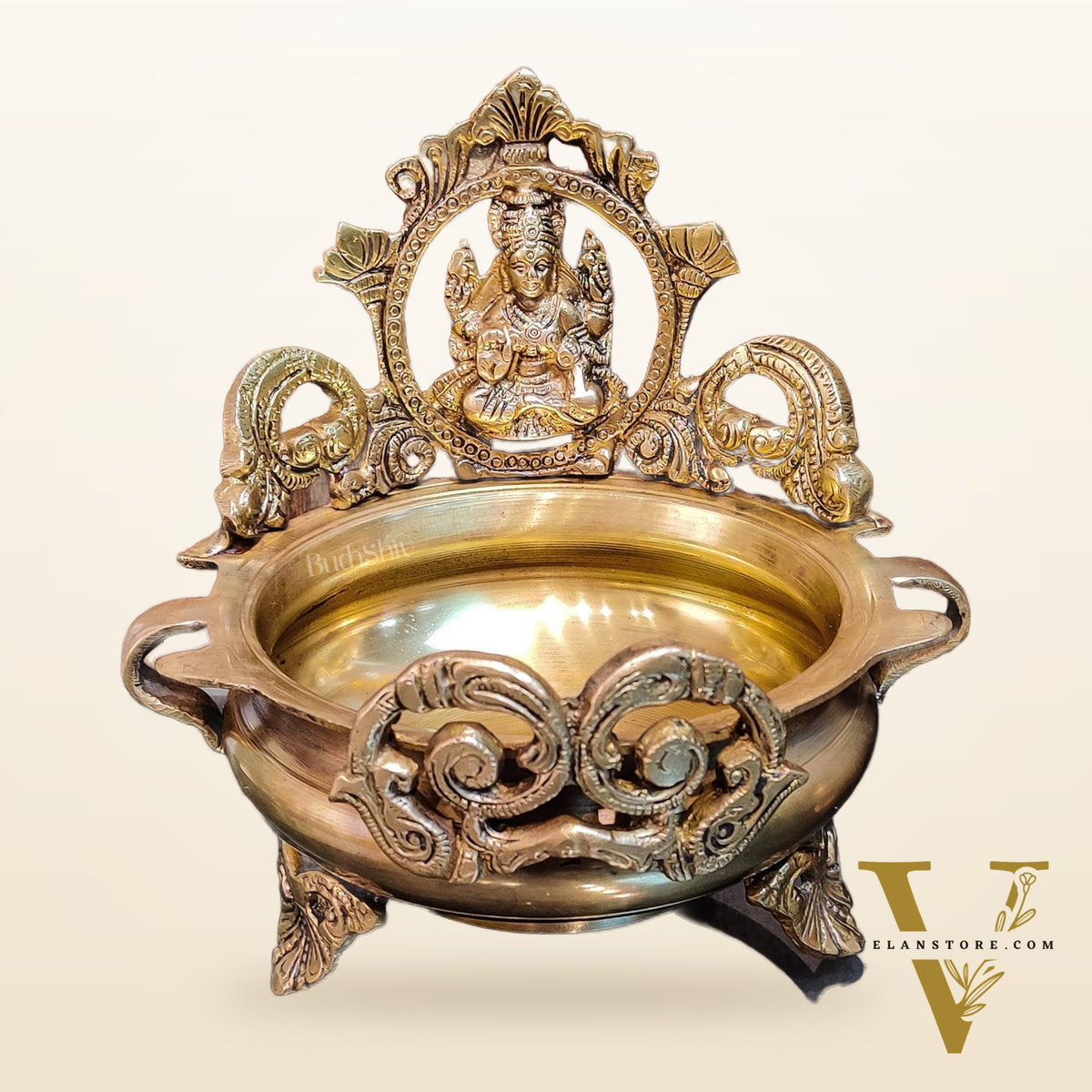 Divine Pair: Lord Ganesha and Goddess Lakshmi Brass Statues on Decorative Urli