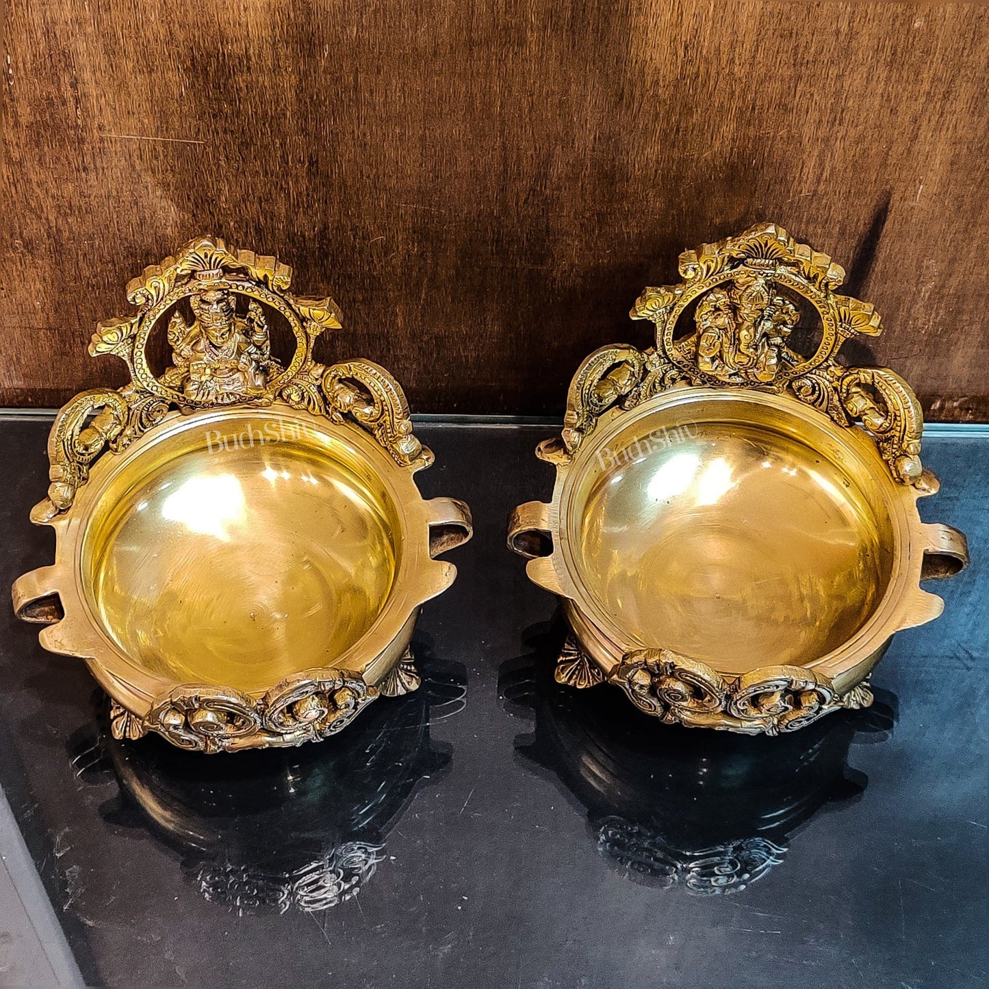 Divine Pair: Lord Ganesha and Goddess Lakshmi Brass Statues on Decorative Urli