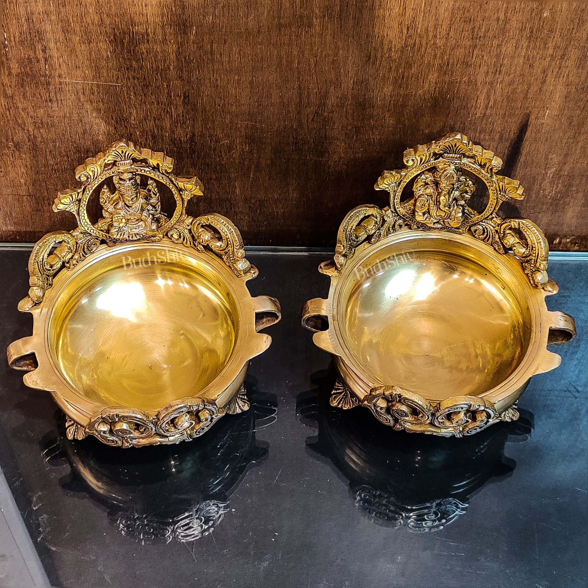 Divine Pair: Lord Ganesha and Goddess Lakshmi Brass Statues on Decorative Urli