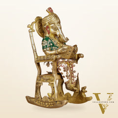 Enchanting 11-Inch Pure Brass Reading Ganesha on Rocking Chair Idol