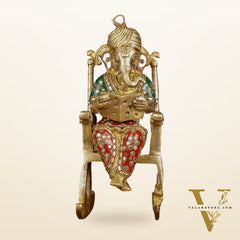 Enchanting 11-Inch Pure Brass Reading Ganesha on Rocking Chair Idol