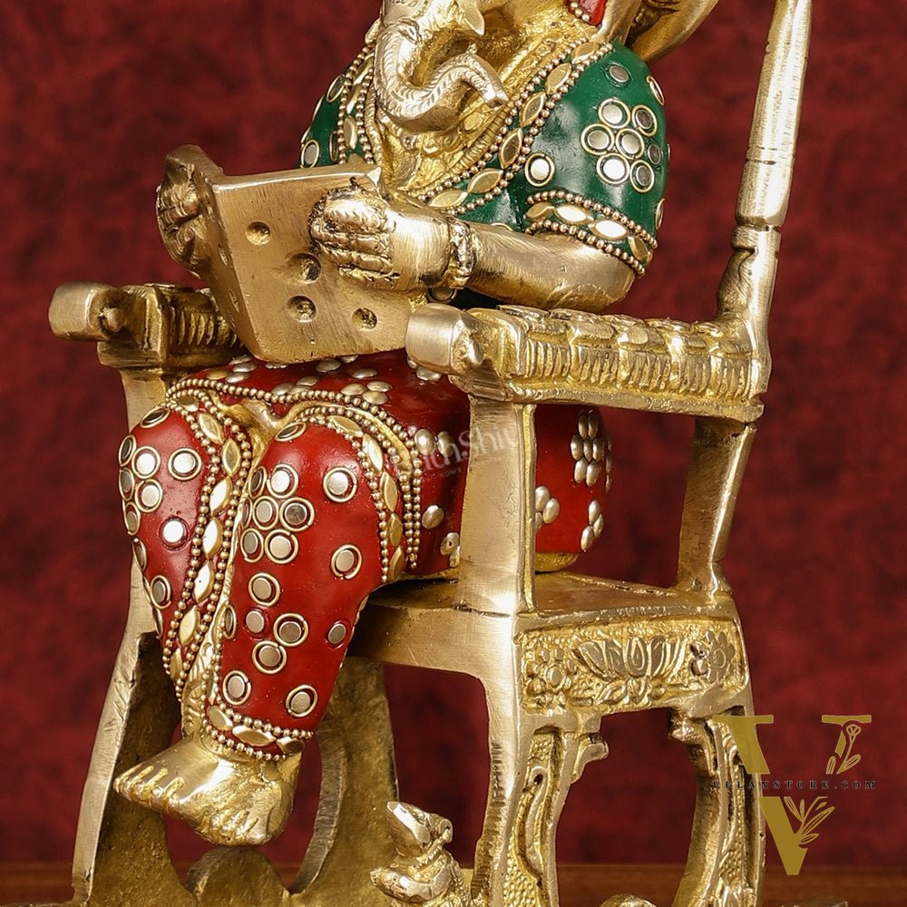 Enchanting 11-Inch Pure Brass Reading Ganesha on Rocking Chair Idol