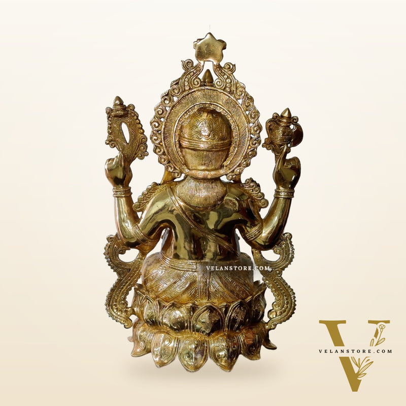 Ganesha Brass Idol 21 inches high seated on a lotus base lacquer coated