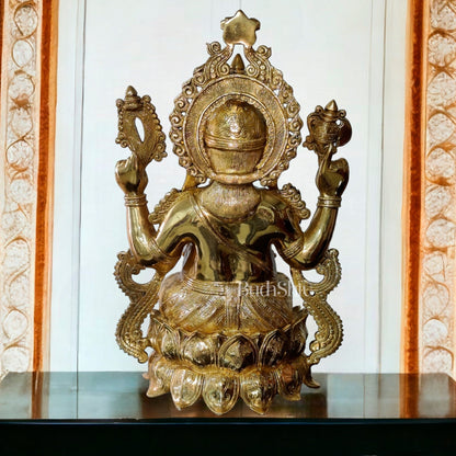 Ganesha Brass Idol 21 inches high seated on a lotus base lacquer coated