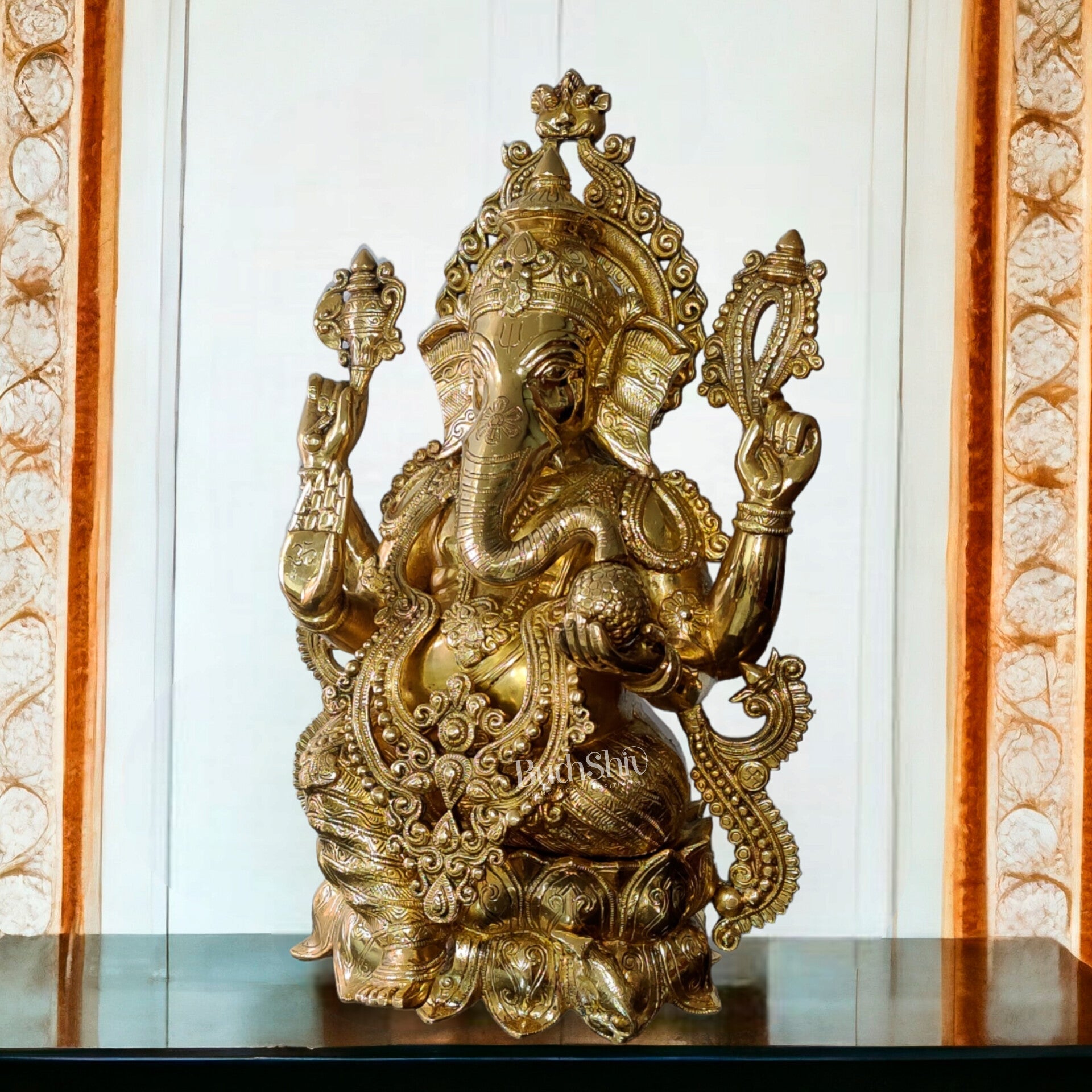 Ganesha Brass Idol 21 inches high seated on a lotus base lacquer coated
