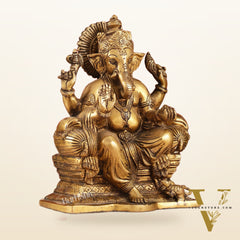 Ganesha on a sofa brass idol 10 inch antique finish