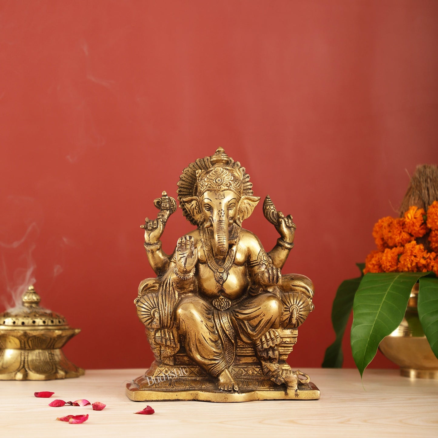 Ganesha on a sofa brass idol 10 inch antique finish