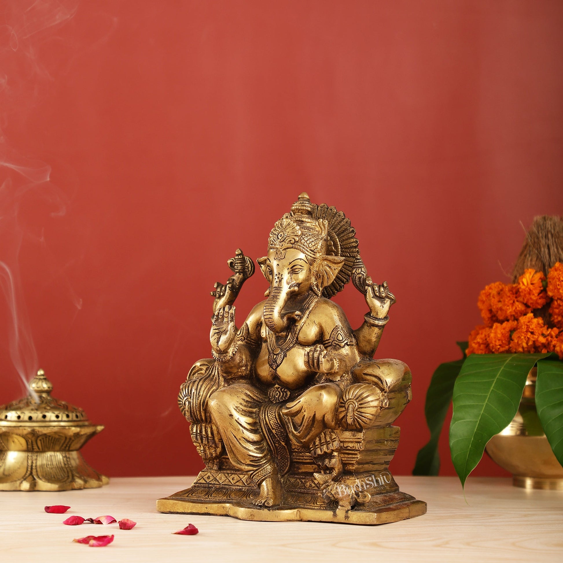 Ganesha on a sofa brass idol 10 inch antique finish