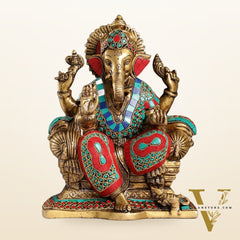 Ganesha on a sofa embossed brass idol 10 inch