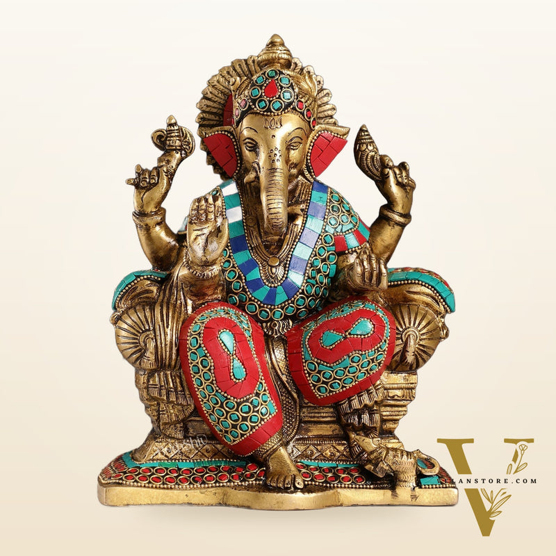 Ganesha on a sofa embossed brass idol 10 inch