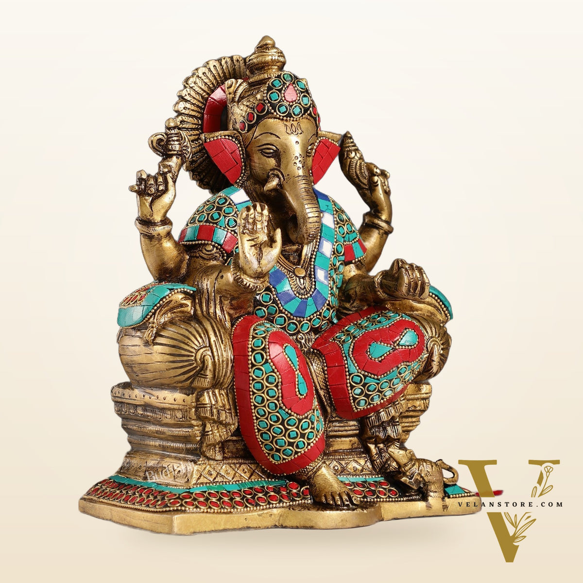 Ganesha on a sofa embossed brass idol 10 inch