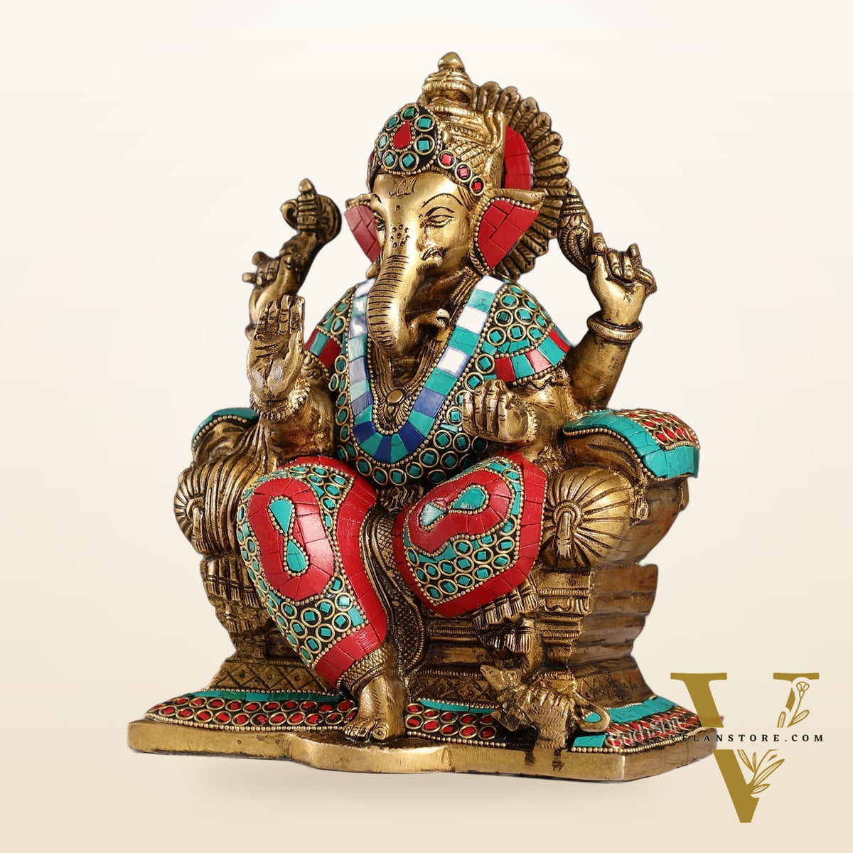 Ganesha on a sofa embossed brass idol 10 inch