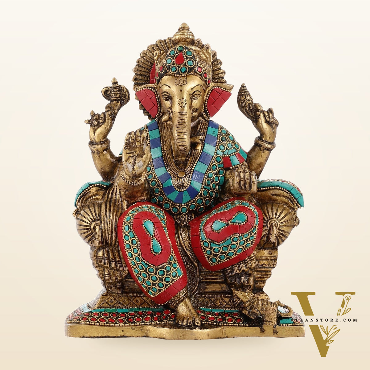 Ganesha on a sofa embossed brass idol 10 inch