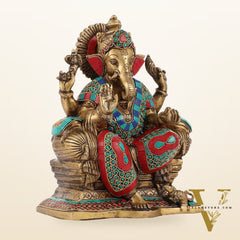 Ganesha on a sofa embossed brass idol 10 inch