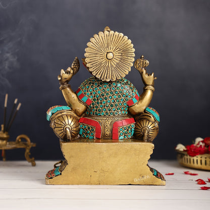 Ganesha on a sofa embossed brass idol 10 inch