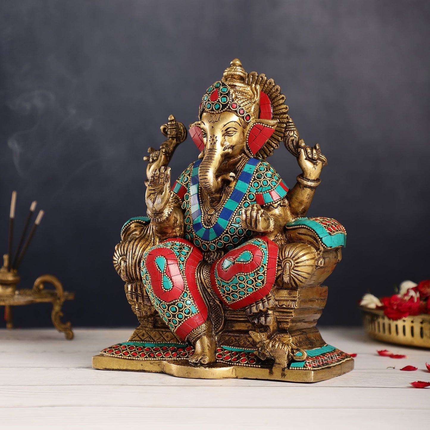 Ganesha on a sofa embossed brass idol 10 inch