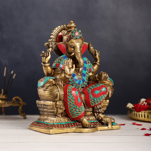 Ganesha on a sofa embossed brass idol 10 inch