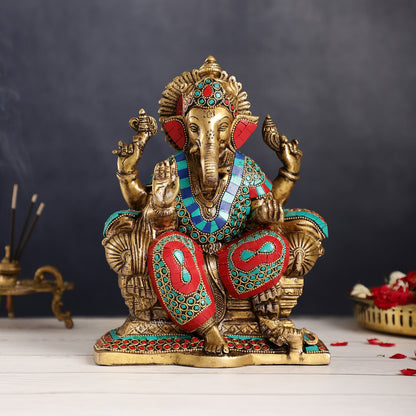 Ganesha on a sofa embossed brass idol 10 inch