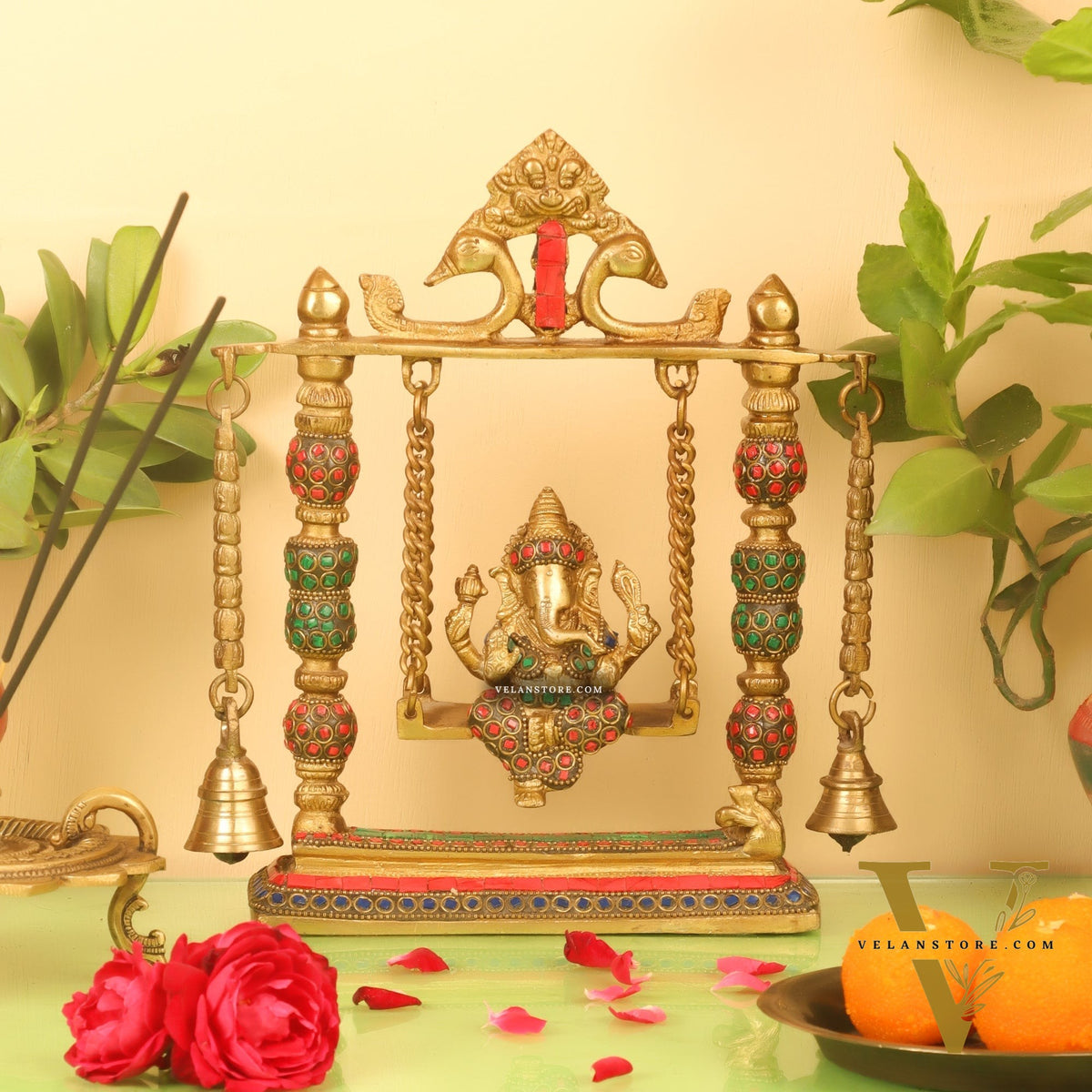 Ganesha on a swing pure brass with meenakari stonework