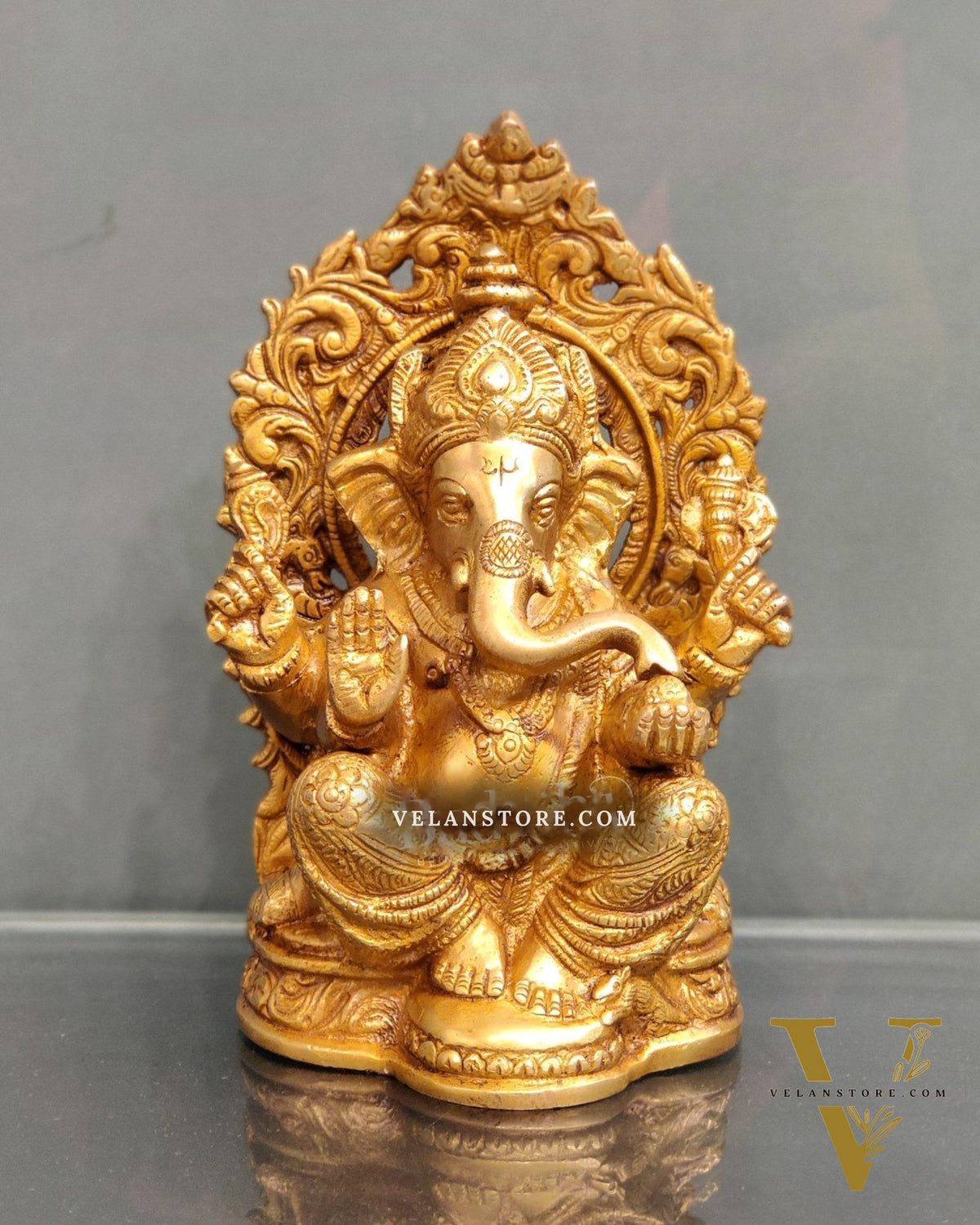 Ganesha on a throne brass idol 7 inch