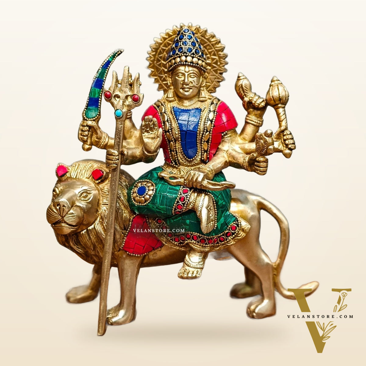 Goddess Durga brass idol with 8 arms sitting on lion with stonework 9 inches